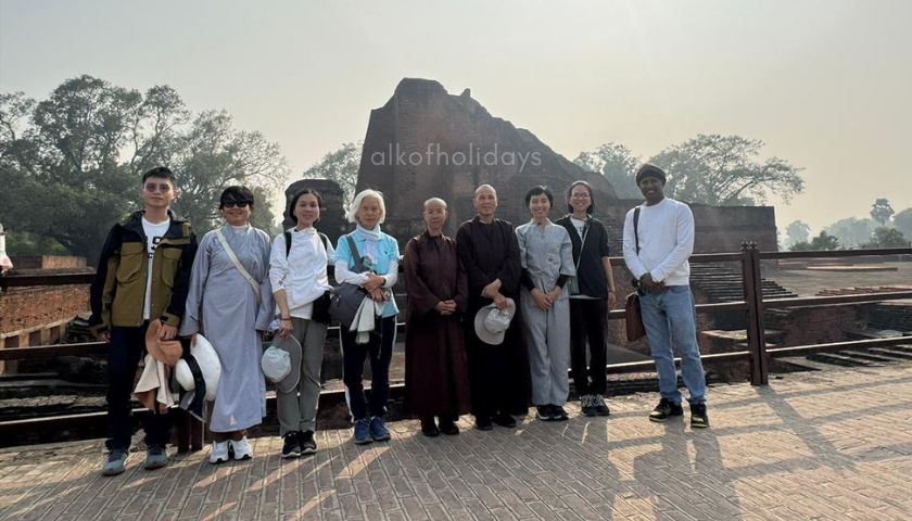 Our Buddhist group from the USA, Canada, and Australia visiting Nalanda Ruins with escort guide Deepak